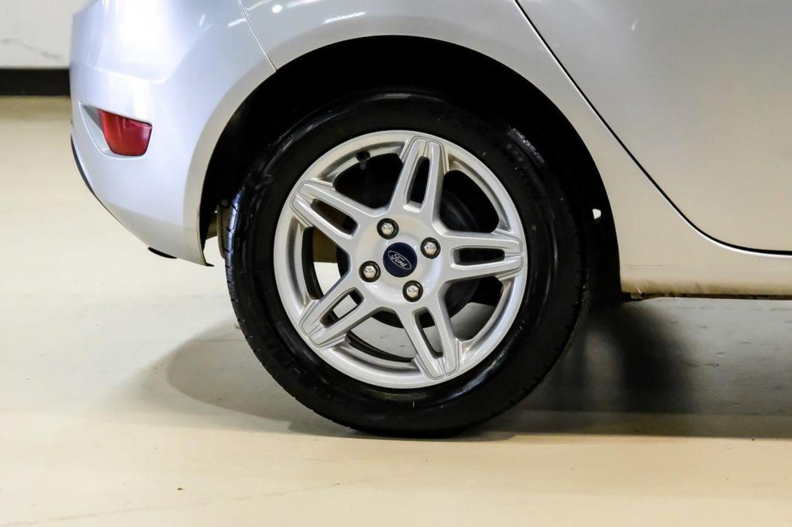 2019 Ingot Silver /Medium Light Stone Ford Fiesta SE (3FADP4EJ1KM) with an 1.6L I4 Ti-VCT engine, Automatic transmission, located at 15300 Midway Rd., Addison, TX, 75001, (972) 702-0011, 32.958321, -96.838074 - Photo#47