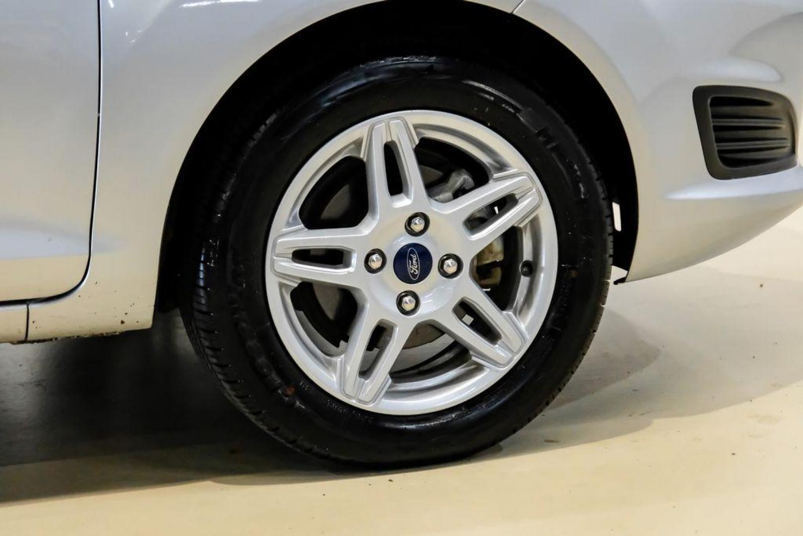 2019 Ingot Silver /Medium Light Stone Ford Fiesta SE (3FADP4EJ1KM) with an 1.6L I4 Ti-VCT engine, Automatic transmission, located at 15300 Midway Rd., Addison, TX, 75001, (972) 702-0011, 32.958321, -96.838074 - Photo#48