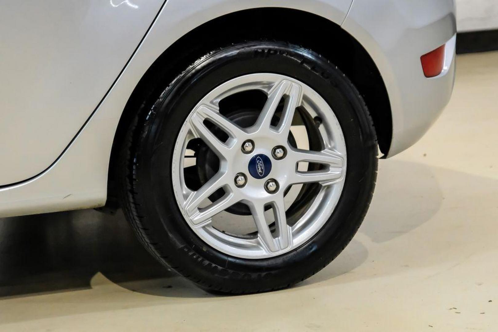 2019 Ingot Silver /Medium Light Stone Ford Fiesta SE (3FADP4EJ1KM) with an 1.6L I4 Ti-VCT engine, Automatic transmission, located at 15300 Midway Rd., Addison, TX, 75001, (972) 702-0011, 32.958321, -96.838074 - Photo#50