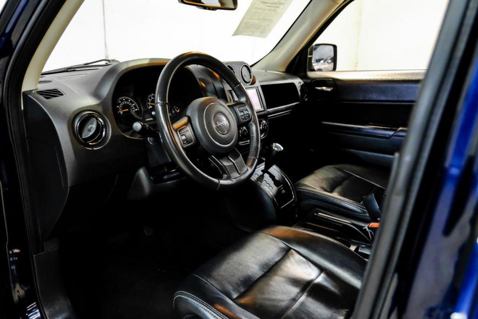 2016 True Blue Pearlcoat /Gray Jeep Patriot High Altitude (1C4NJRFB5GD) with an 2.4L I4 DOHC 16V Dual VVT engine, Automatic transmission, located at 15300 Midway Rd., Addison, TX, 75001, (972) 702-0011, 32.958321, -96.838074 - Photo#2