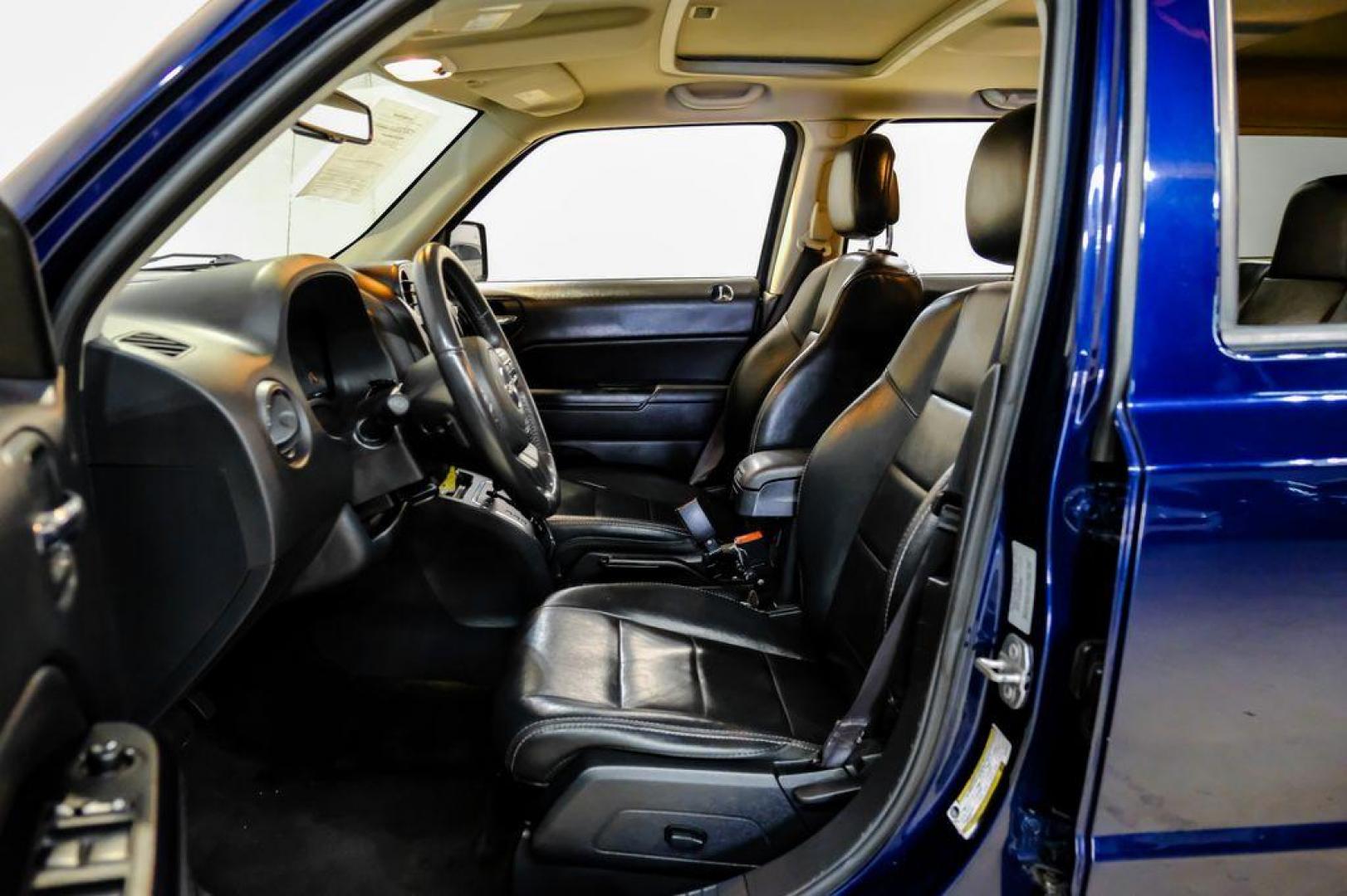 2016 True Blue Pearlcoat /Gray Jeep Patriot High Altitude (1C4NJRFB5GD) with an 2.4L I4 DOHC 16V Dual VVT engine, Automatic transmission, located at 15300 Midway Rd., Addison, TX, 75001, (972) 702-0011, 32.958321, -96.838074 - Photo#3