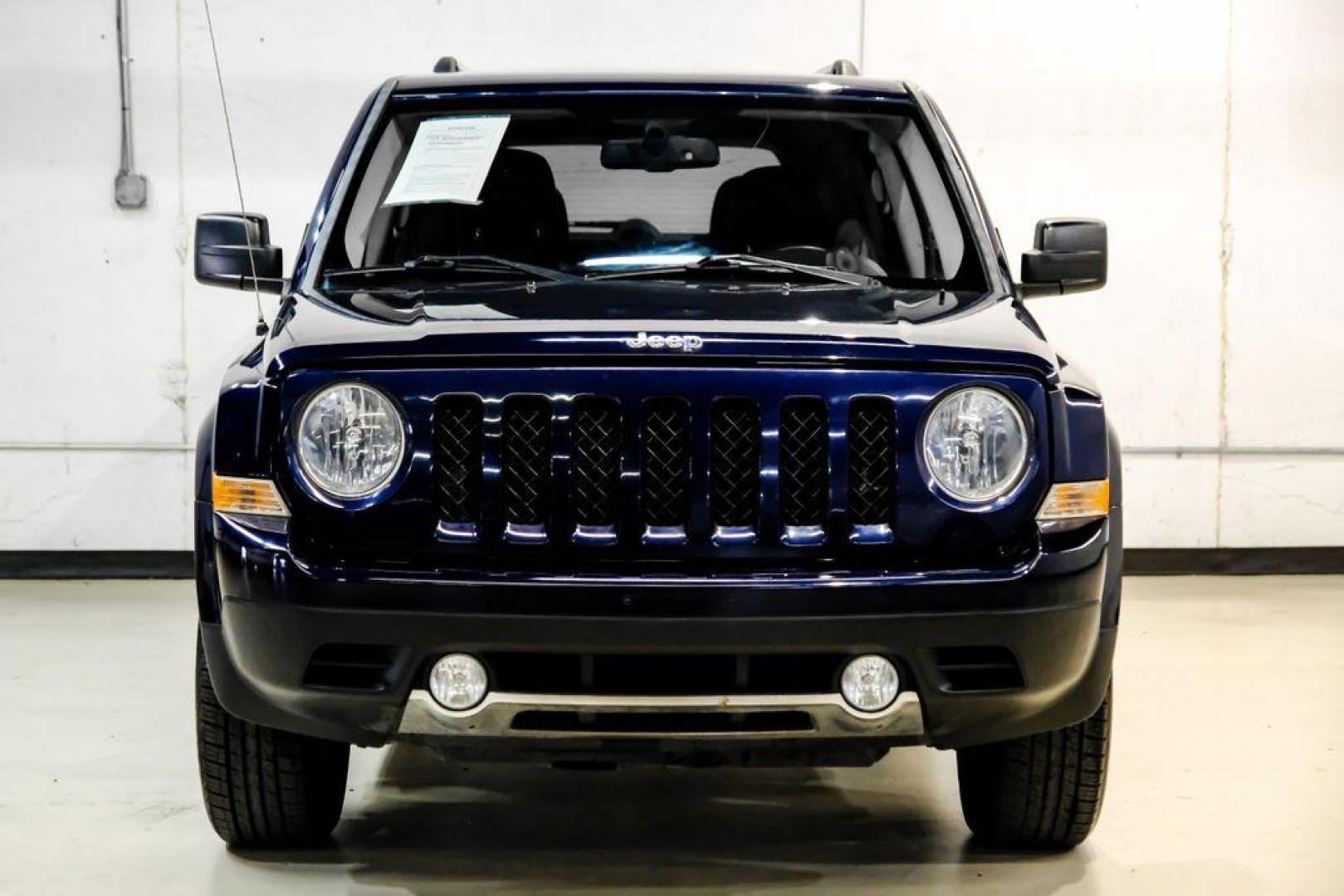 2016 True Blue Pearlcoat /Gray Jeep Patriot High Altitude (1C4NJRFB5GD) with an 2.4L I4 DOHC 16V Dual VVT engine, Automatic transmission, located at 15300 Midway Rd., Addison, TX, 75001, (972) 702-0011, 32.958321, -96.838074 - Photo#5