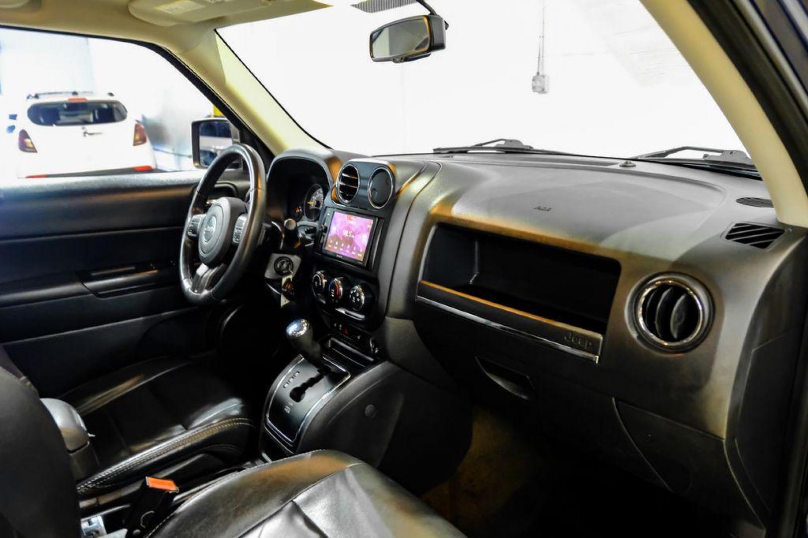 2016 True Blue Pearlcoat /Gray Jeep Patriot High Altitude (1C4NJRFB5GD) with an 2.4L I4 DOHC 16V Dual VVT engine, Automatic transmission, located at 15300 Midway Rd., Addison, TX, 75001, (972) 702-0011, 32.958321, -96.838074 - Photo#13