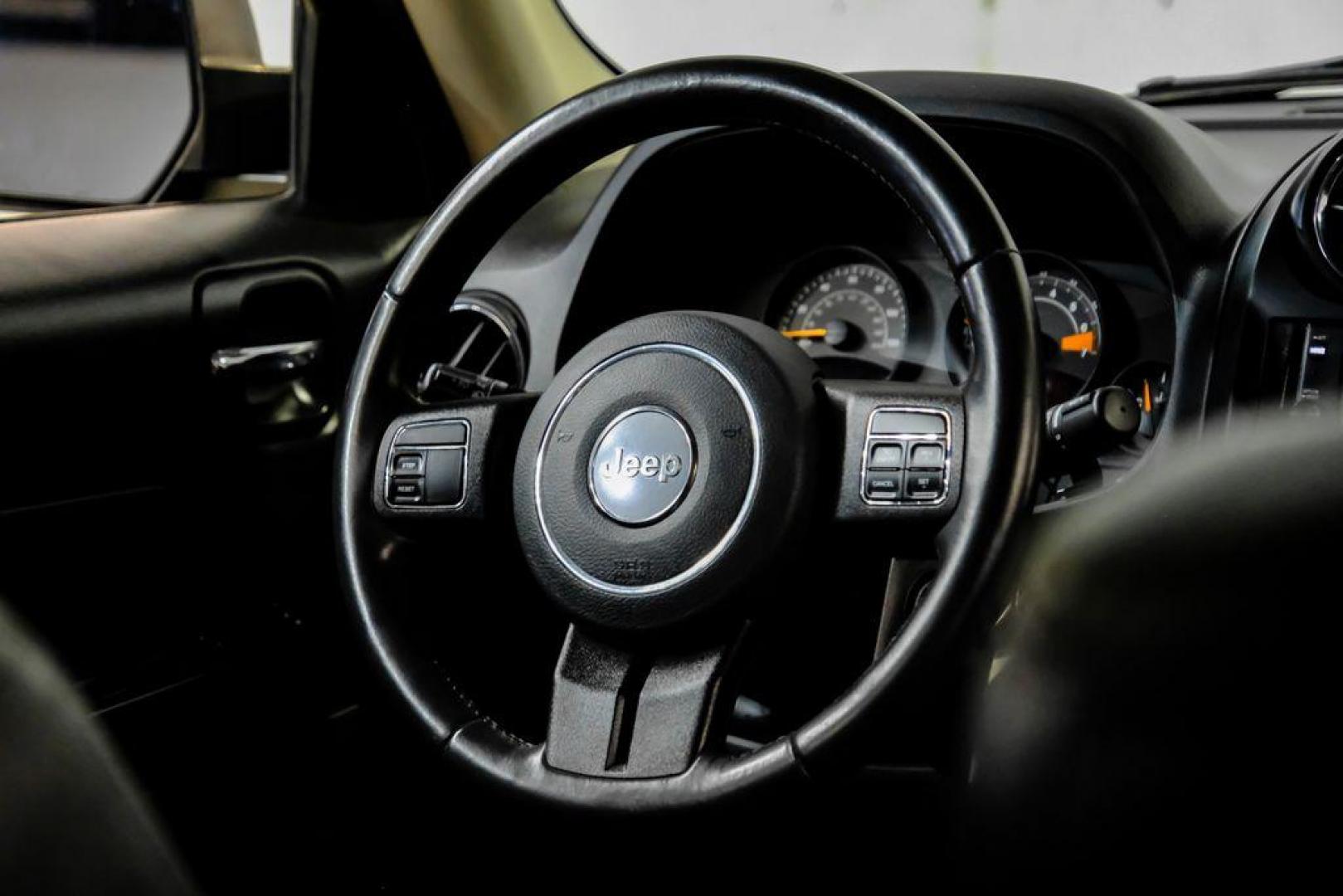 2016 True Blue Pearlcoat /Gray Jeep Patriot High Altitude (1C4NJRFB5GD) with an 2.4L I4 DOHC 16V Dual VVT engine, Automatic transmission, located at 15300 Midway Rd., Addison, TX, 75001, (972) 702-0011, 32.958321, -96.838074 - Photo#14