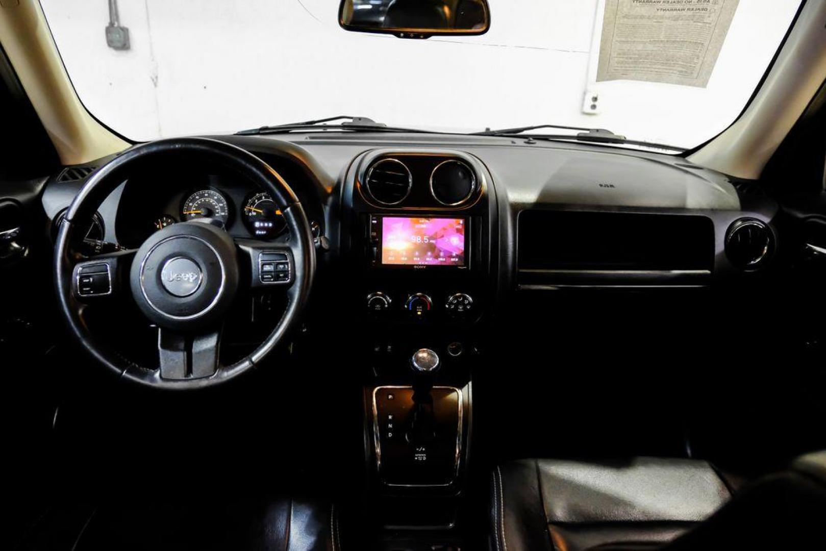 2016 True Blue Pearlcoat /Gray Jeep Patriot High Altitude (1C4NJRFB5GD) with an 2.4L I4 DOHC 16V Dual VVT engine, Automatic transmission, located at 15300 Midway Rd., Addison, TX, 75001, (972) 702-0011, 32.958321, -96.838074 - Photo#15