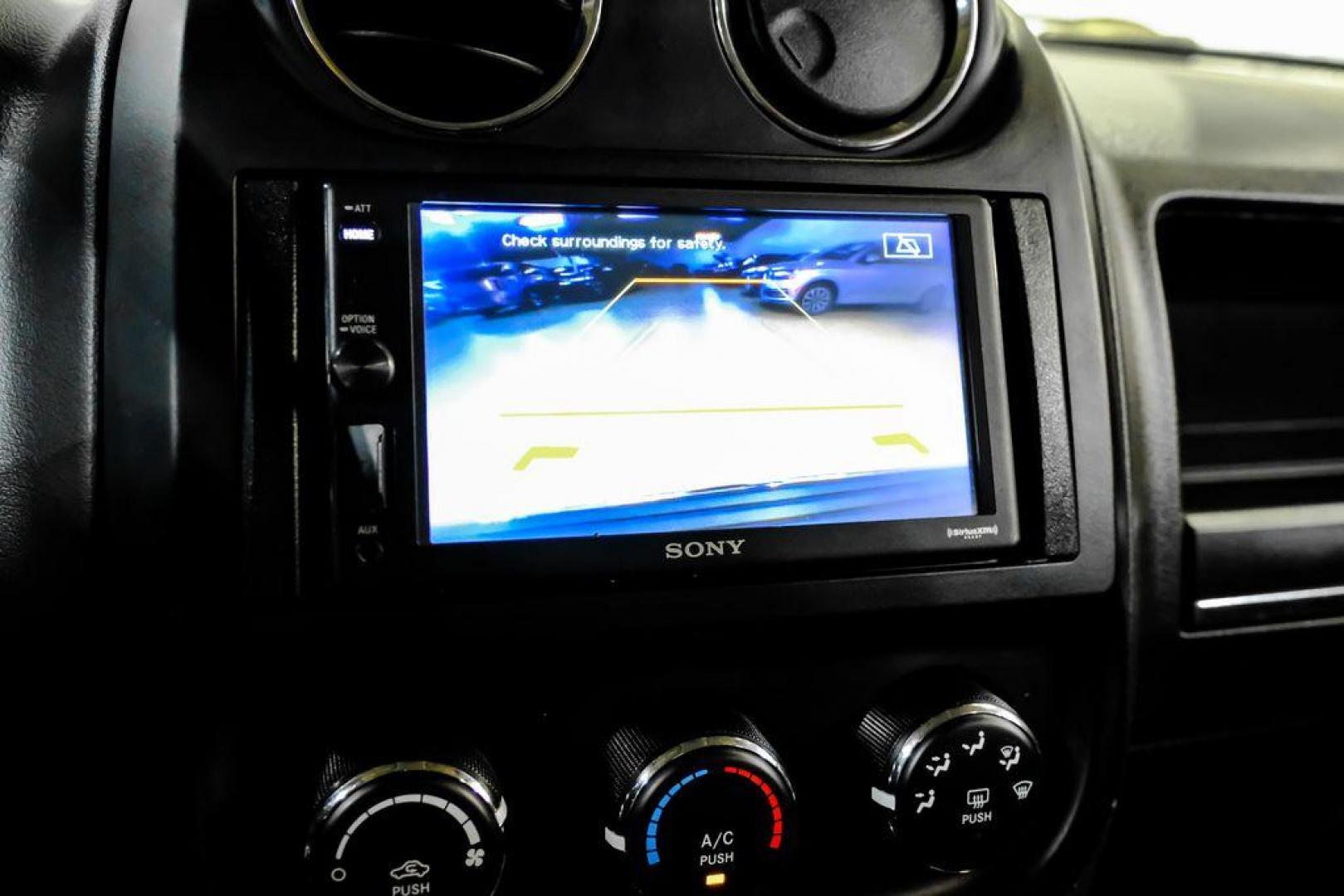 2016 True Blue Pearlcoat /Gray Jeep Patriot High Altitude (1C4NJRFB5GD) with an 2.4L I4 DOHC 16V Dual VVT engine, Automatic transmission, located at 15300 Midway Rd., Addison, TX, 75001, (972) 702-0011, 32.958321, -96.838074 - Photo#21