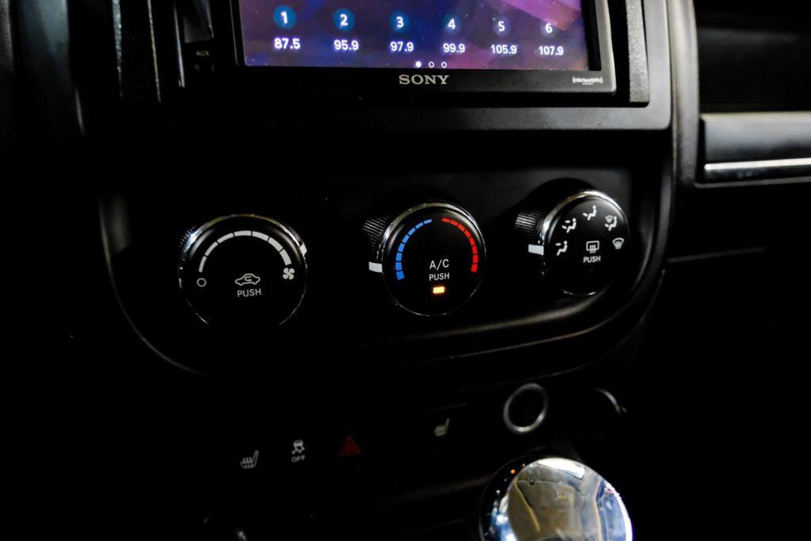 2016 True Blue Pearlcoat /Gray Jeep Patriot High Altitude (1C4NJRFB5GD) with an 2.4L I4 DOHC 16V Dual VVT engine, Automatic transmission, located at 15300 Midway Rd., Addison, TX, 75001, (972) 702-0011, 32.958321, -96.838074 - Photo#23