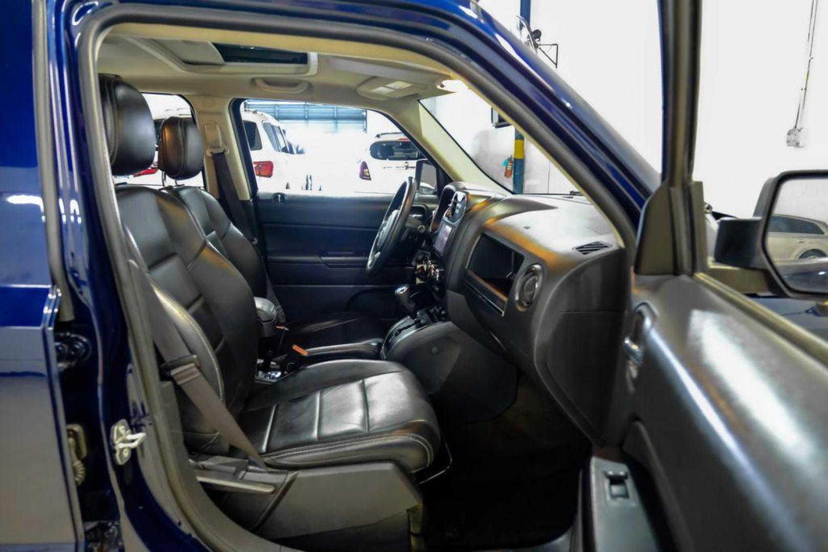 2016 True Blue Pearlcoat /Gray Jeep Patriot High Altitude (1C4NJRFB5GD) with an 2.4L I4 DOHC 16V Dual VVT engine, Automatic transmission, located at 15300 Midway Rd., Addison, TX, 75001, (972) 702-0011, 32.958321, -96.838074 - Photo#28