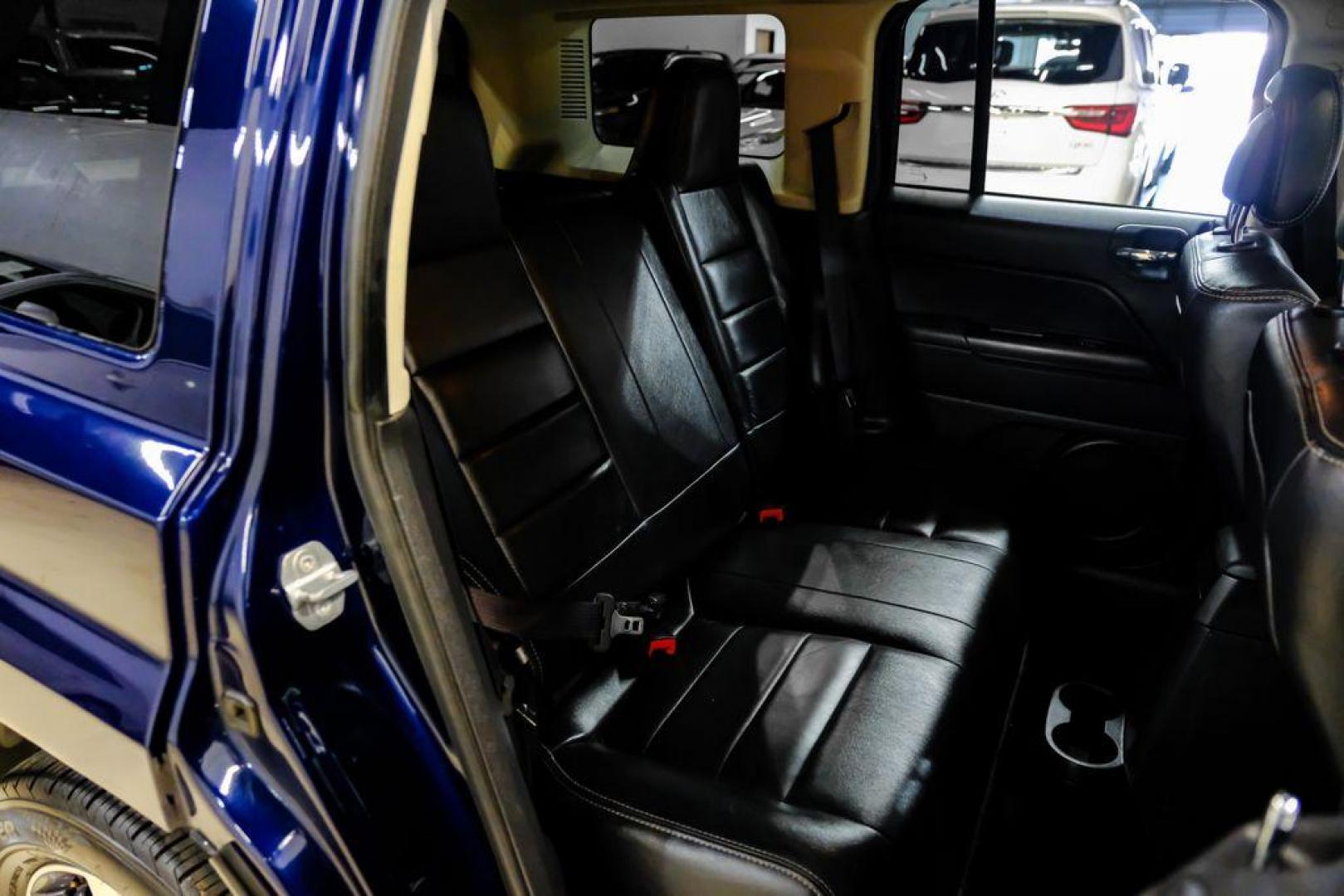 2016 True Blue Pearlcoat /Gray Jeep Patriot High Altitude (1C4NJRFB5GD) with an 2.4L I4 DOHC 16V Dual VVT engine, Automatic transmission, located at 15300 Midway Rd., Addison, TX, 75001, (972) 702-0011, 32.958321, -96.838074 - Photo#30