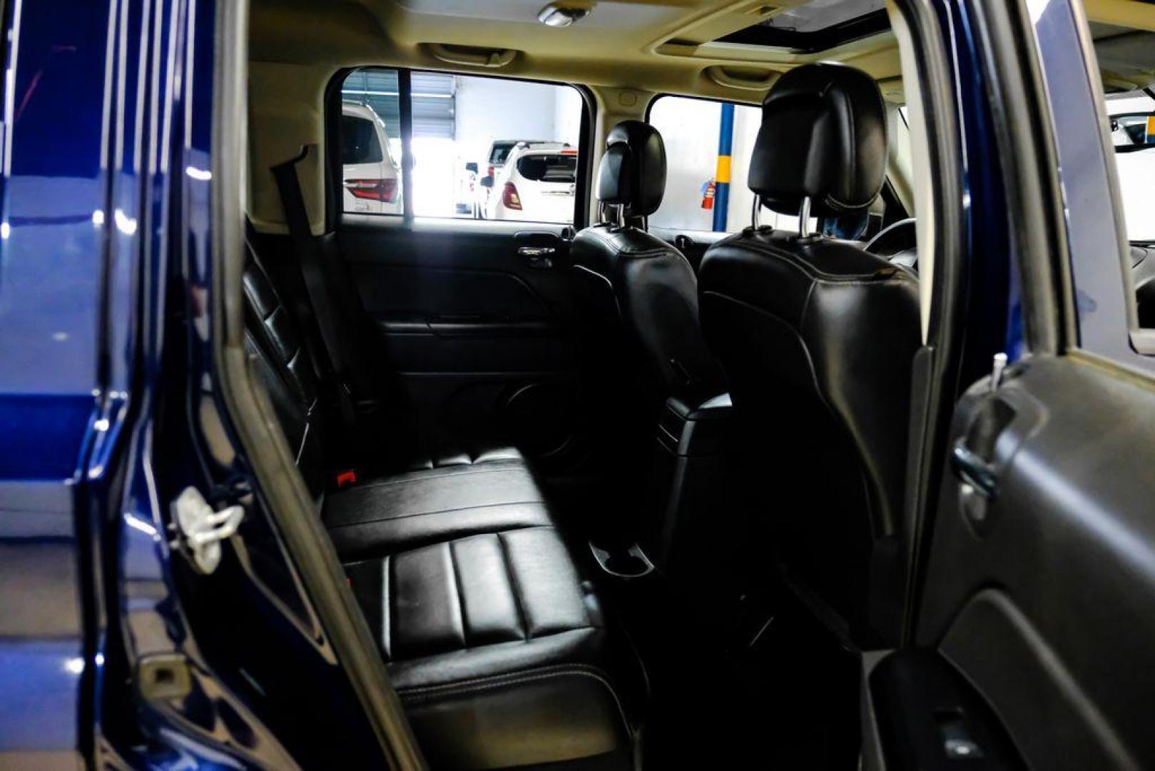 2016 True Blue Pearlcoat /Gray Jeep Patriot High Altitude (1C4NJRFB5GD) with an 2.4L I4 DOHC 16V Dual VVT engine, Automatic transmission, located at 15300 Midway Rd., Addison, TX, 75001, (972) 702-0011, 32.958321, -96.838074 - Photo#31