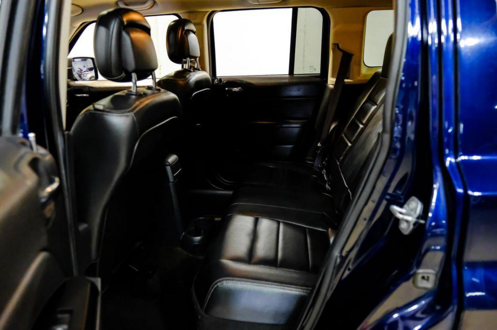 2016 True Blue Pearlcoat /Gray Jeep Patriot High Altitude (1C4NJRFB5GD) with an 2.4L I4 DOHC 16V Dual VVT engine, Automatic transmission, located at 15300 Midway Rd., Addison, TX, 75001, (972) 702-0011, 32.958321, -96.838074 - Photo#32