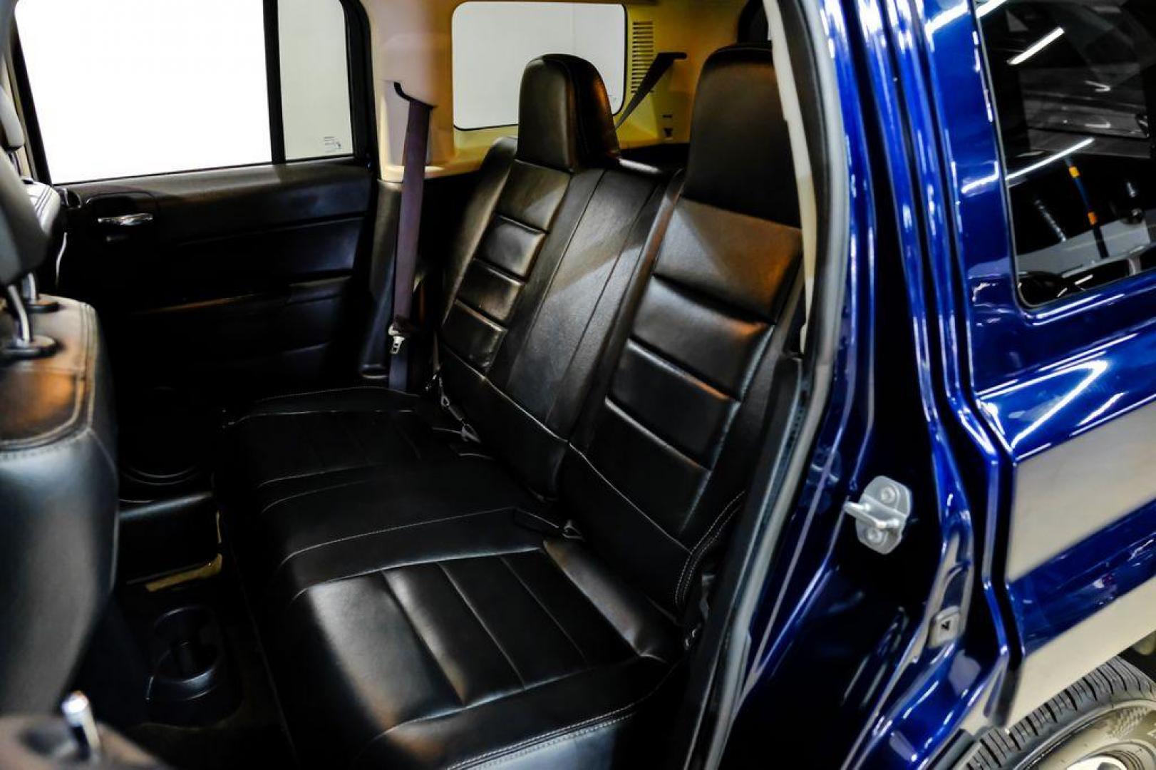 2016 True Blue Pearlcoat /Gray Jeep Patriot High Altitude (1C4NJRFB5GD) with an 2.4L I4 DOHC 16V Dual VVT engine, Automatic transmission, located at 15300 Midway Rd., Addison, TX, 75001, (972) 702-0011, 32.958321, -96.838074 - Photo#33