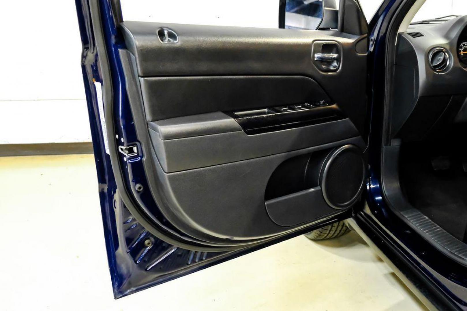 2016 True Blue Pearlcoat /Gray Jeep Patriot High Altitude (1C4NJRFB5GD) with an 2.4L I4 DOHC 16V Dual VVT engine, Automatic transmission, located at 15300 Midway Rd., Addison, TX, 75001, (972) 702-0011, 32.958321, -96.838074 - Photo#36