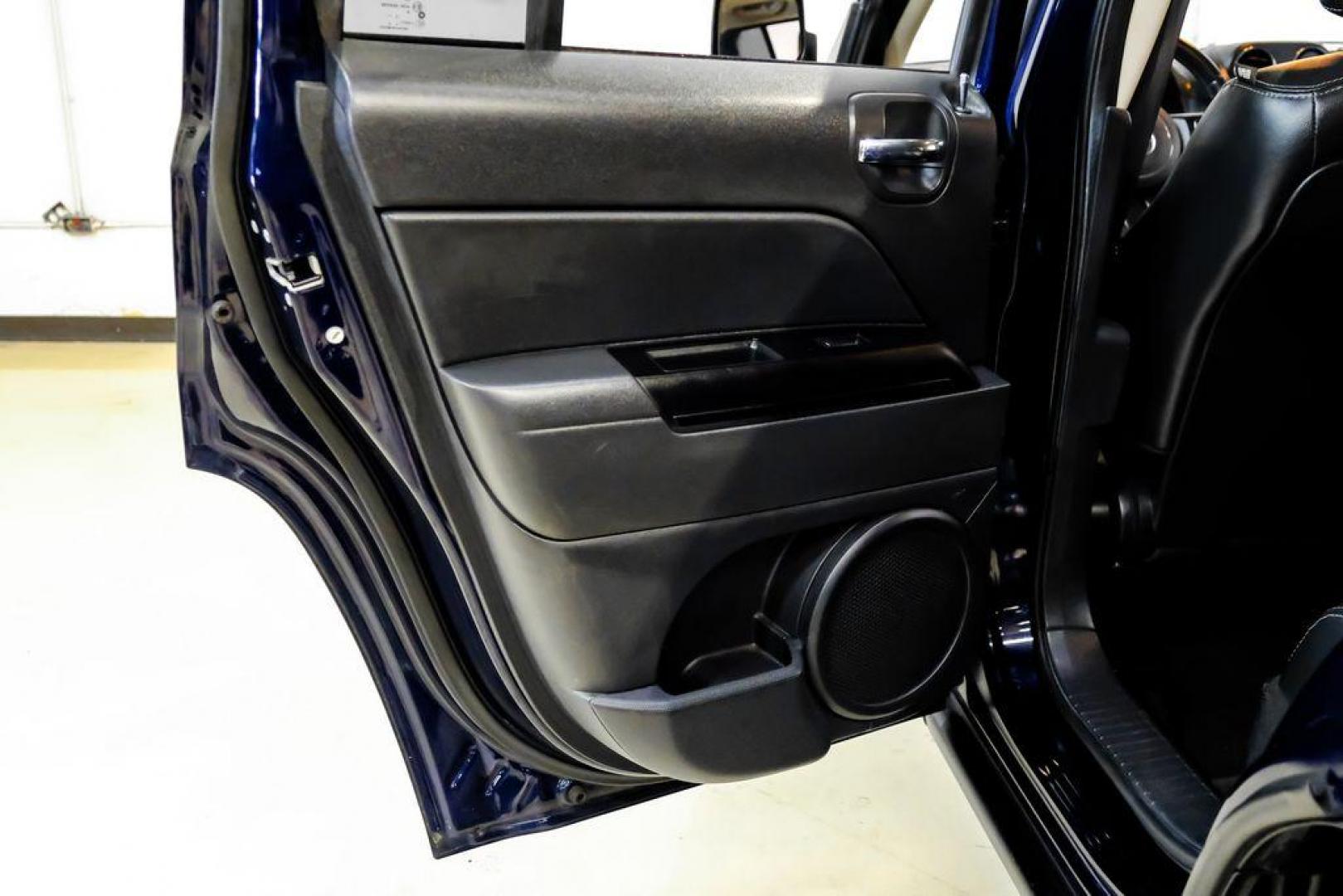 2016 True Blue Pearlcoat /Gray Jeep Patriot High Altitude (1C4NJRFB5GD) with an 2.4L I4 DOHC 16V Dual VVT engine, Automatic transmission, located at 15300 Midway Rd., Addison, TX, 75001, (972) 702-0011, 32.958321, -96.838074 - Photo#39