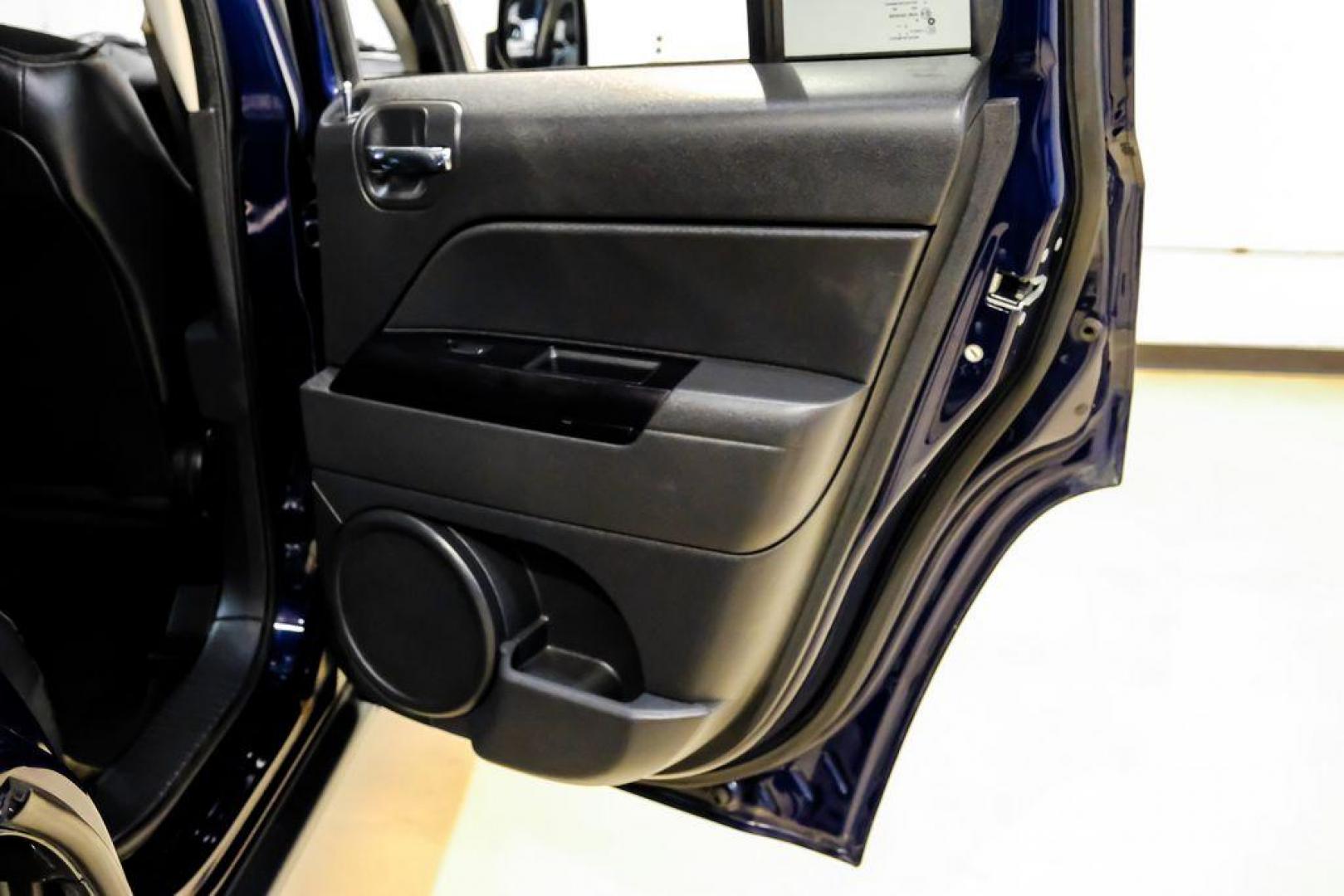 2016 True Blue Pearlcoat /Gray Jeep Patriot High Altitude (1C4NJRFB5GD) with an 2.4L I4 DOHC 16V Dual VVT engine, Automatic transmission, located at 15300 Midway Rd., Addison, TX, 75001, (972) 702-0011, 32.958321, -96.838074 - Photo#40