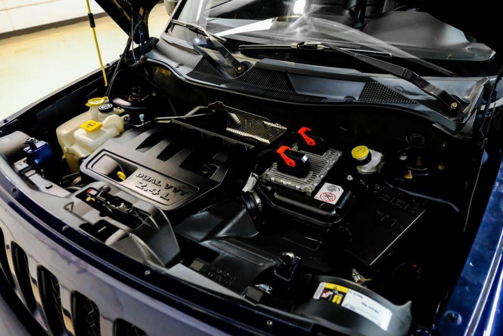 2016 True Blue Pearlcoat /Gray Jeep Patriot High Altitude (1C4NJRFB5GD) with an 2.4L I4 DOHC 16V Dual VVT engine, Automatic transmission, located at 15300 Midway Rd., Addison, TX, 75001, (972) 702-0011, 32.958321, -96.838074 - Photo#43