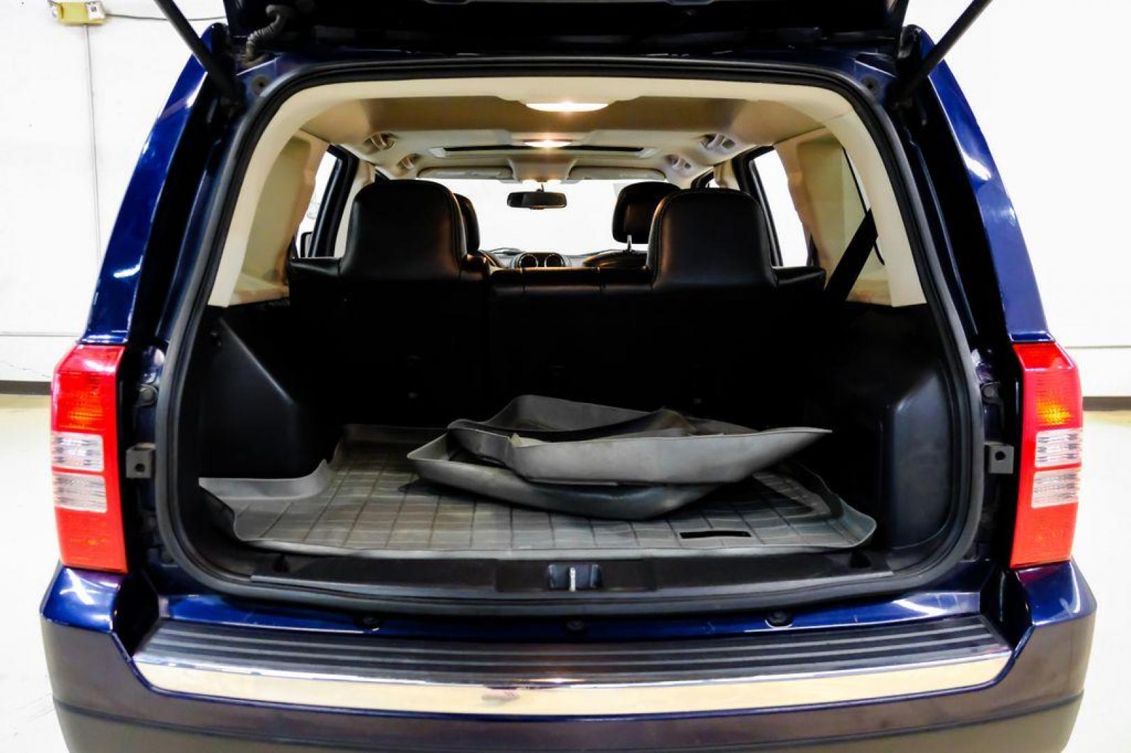 2016 True Blue Pearlcoat /Gray Jeep Patriot High Altitude (1C4NJRFB5GD) with an 2.4L I4 DOHC 16V Dual VVT engine, Automatic transmission, located at 15300 Midway Rd., Addison, TX, 75001, (972) 702-0011, 32.958321, -96.838074 - Photo#47