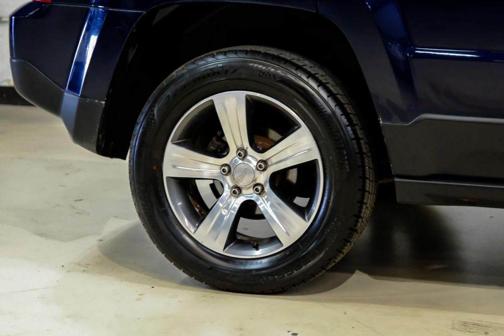 2016 True Blue Pearlcoat /Gray Jeep Patriot High Altitude (1C4NJRFB5GD) with an 2.4L I4 DOHC 16V Dual VVT engine, Automatic transmission, located at 15300 Midway Rd., Addison, TX, 75001, (972) 702-0011, 32.958321, -96.838074 - Photo#48