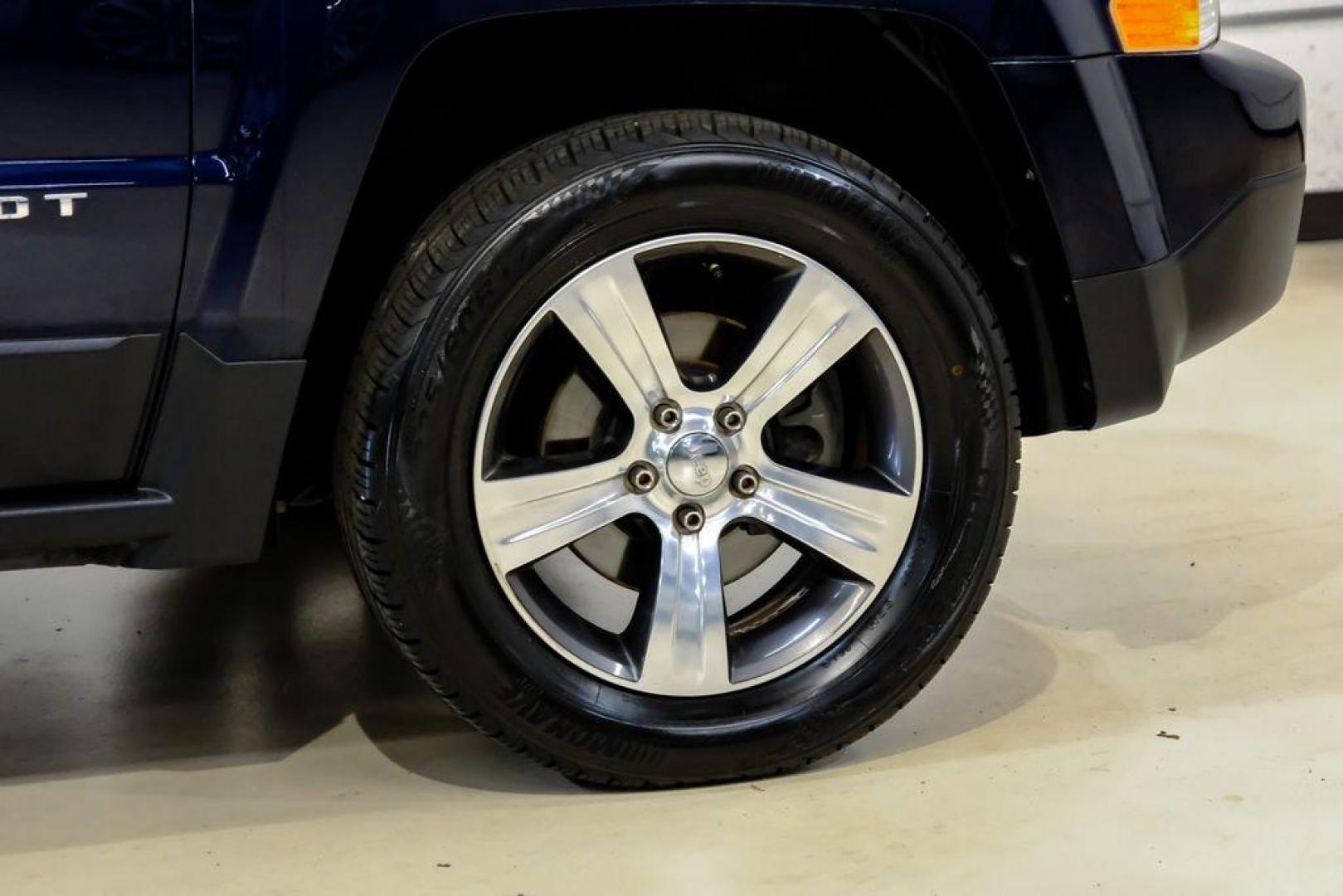 2016 True Blue Pearlcoat /Gray Jeep Patriot High Altitude (1C4NJRFB5GD) with an 2.4L I4 DOHC 16V Dual VVT engine, Automatic transmission, located at 15300 Midway Rd., Addison, TX, 75001, (972) 702-0011, 32.958321, -96.838074 - Photo#49