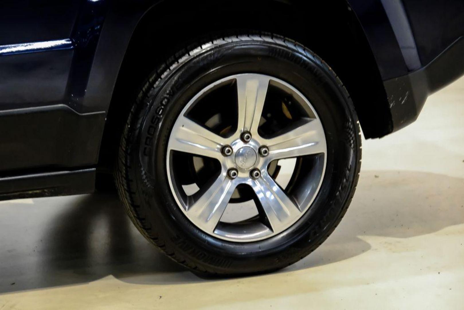 2016 True Blue Pearlcoat /Gray Jeep Patriot High Altitude (1C4NJRFB5GD) with an 2.4L I4 DOHC 16V Dual VVT engine, Automatic transmission, located at 15300 Midway Rd., Addison, TX, 75001, (972) 702-0011, 32.958321, -96.838074 - Photo#51