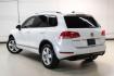 2014 Pure White /Cornsilk Beige Volkswagen Touareg 3.6L (WVGEF9BP5ED) with an 3.6L V6 DOHC engine, Automatic transmission, located at 15300 Midway Rd., Addison, TX, 75001, (972) 702-0011, 32.958321, -96.838074 - Photo#10