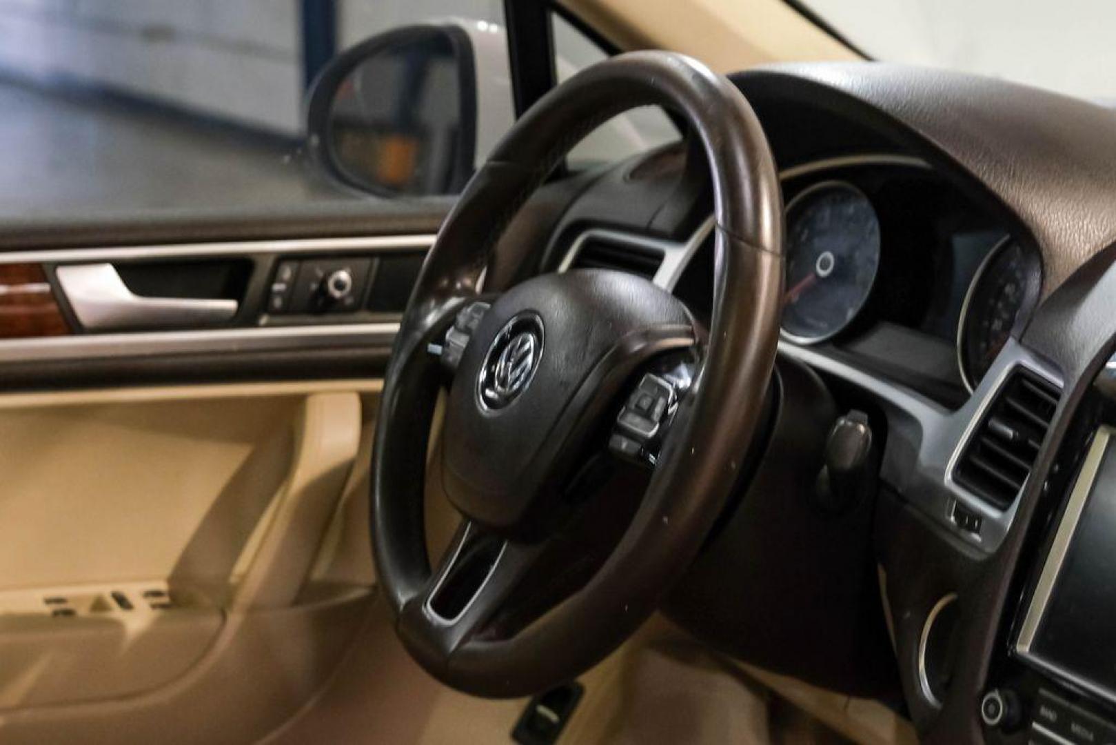 2014 Pure White /Cornsilk Beige Volkswagen Touareg 3.6L (WVGEF9BP5ED) with an 3.6L V6 DOHC engine, Automatic transmission, located at 15300 Midway Rd., Addison, TX, 75001, (972) 702-0011, 32.958321, -96.838074 - Photo#14