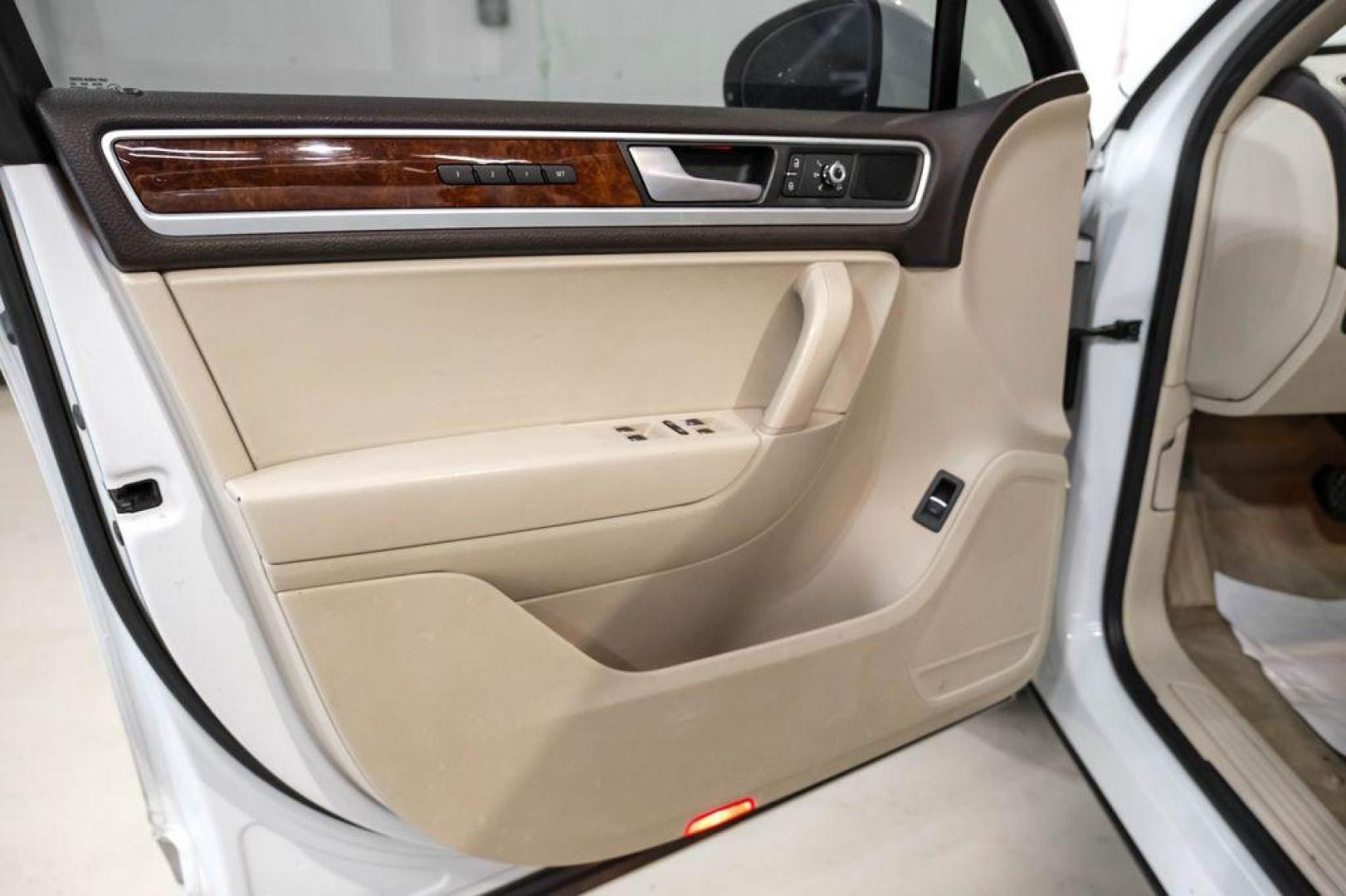 2014 Pure White /Cornsilk Beige Volkswagen Touareg 3.6L (WVGEF9BP5ED) with an 3.6L V6 DOHC engine, Automatic transmission, located at 15300 Midway Rd., Addison, TX, 75001, (972) 702-0011, 32.958321, -96.838074 - Photo#38