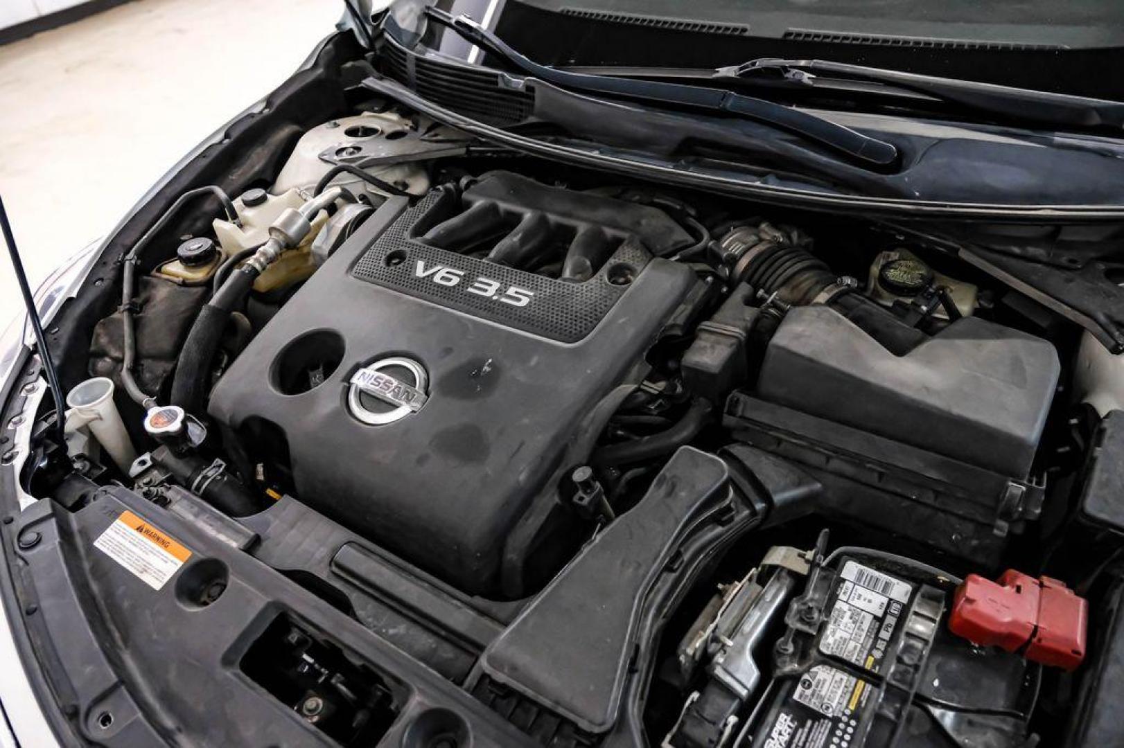 2015 Pearl White /Beige Nissan Altima 3.5 SL (1N4BL3AP6FC) with an 3.5L V6 DOHC 24V engine, CVT transmission, located at 15300 Midway Rd., Addison, TX, 75001, (972) 702-0011, 32.958321, -96.838074 - Photo#51