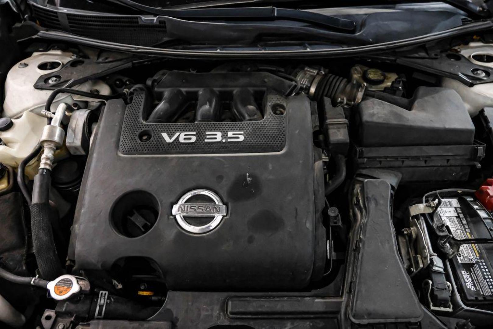 2015 Pearl White /Beige Nissan Altima 3.5 SL (1N4BL3AP6FC) with an 3.5L V6 DOHC 24V engine, CVT transmission, located at 15300 Midway Rd., Addison, TX, 75001, (972) 702-0011, 32.958321, -96.838074 - Photo#52