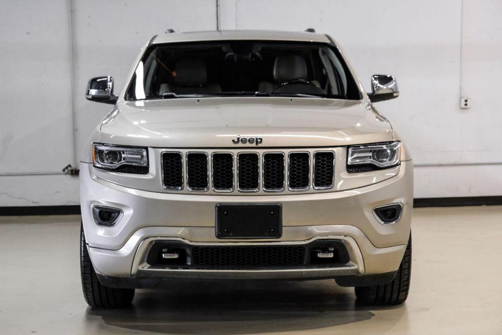 2015 Cashmere Pearlcoat /Light Frost/Brown Jeep Grand Cherokee Overland (1C4RJFCT5FC) with an 5.7L V8 Multi Displacement VVT engine, Automatic transmission, located at 15300 Midway Rd., Addison, TX, 75001, (972) 702-0011, 32.958321, -96.838074 - Photo#5