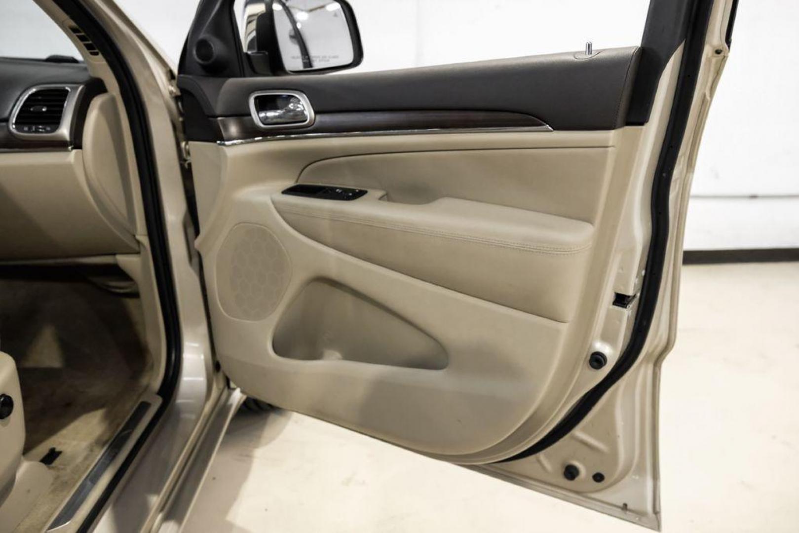 2015 Cashmere Pearlcoat /Light Frost/Brown Jeep Grand Cherokee Overland (1C4RJFCT5FC) with an 5.7L V8 Multi Displacement VVT engine, Automatic transmission, located at 15300 Midway Rd., Addison, TX, 75001, (972) 702-0011, 32.958321, -96.838074 - Photo#51