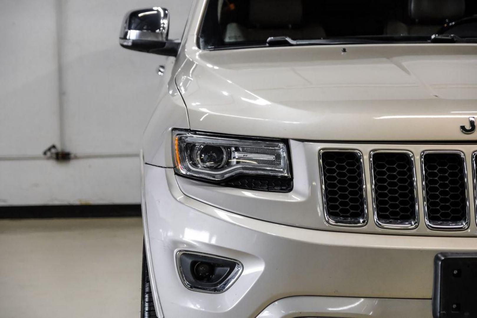 2015 Cashmere Pearlcoat /Light Frost/Brown Jeep Grand Cherokee Overland (1C4RJFCT5FC) with an 5.7L V8 Multi Displacement VVT engine, Automatic transmission, located at 15300 Midway Rd., Addison, TX, 75001, (972) 702-0011, 32.958321, -96.838074 - Photo#54