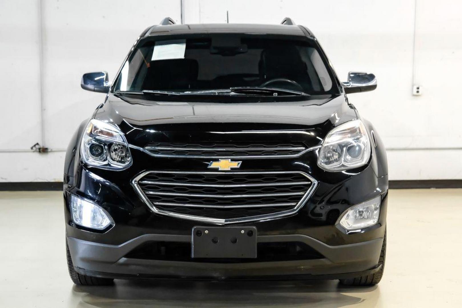 2017 Black Metallic /Jet Black Chevrolet Equinox Premier (2GNALDEK3H1) with an 2.4L 4-Cylinder SIDI DOHC VVT engine, Automatic transmission, located at 15300 Midway Rd., Addison, TX, 75001, (972) 702-0011, 32.958321, -96.838074 - Photo#5