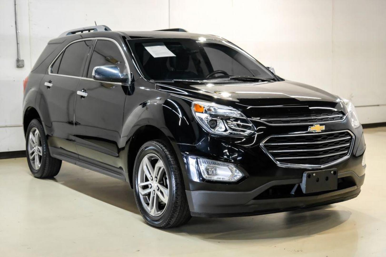 2017 Black Metallic /Jet Black Chevrolet Equinox Premier (2GNALDEK3H1) with an 2.4L 4-Cylinder SIDI DOHC VVT engine, Automatic transmission, located at 15300 Midway Rd., Addison, TX, 75001, (972) 702-0011, 32.958321, -96.838074 - Photo#6