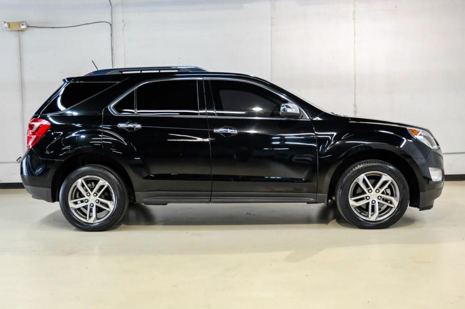 2017 Black Metallic /Jet Black Chevrolet Equinox Premier (2GNALDEK3H1) with an 2.4L 4-Cylinder SIDI DOHC VVT engine, Automatic transmission, located at 15300 Midway Rd., Addison, TX, 75001, (972) 702-0011, 32.958321, -96.838074 - Photo#7