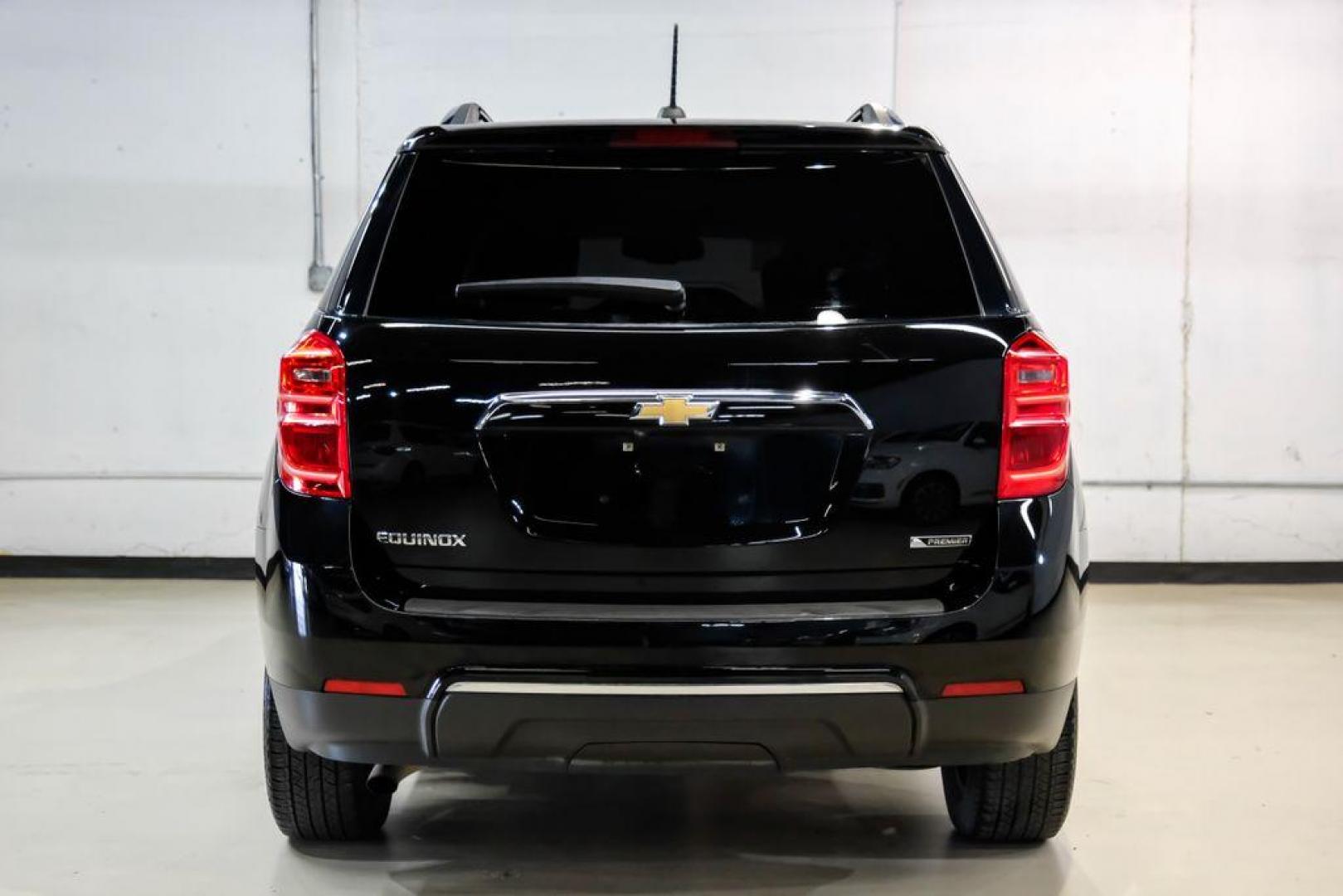 2017 Black Metallic /Jet Black Chevrolet Equinox Premier (2GNALDEK3H1) with an 2.4L 4-Cylinder SIDI DOHC VVT engine, Automatic transmission, located at 15300 Midway Rd., Addison, TX, 75001, (972) 702-0011, 32.958321, -96.838074 - Photo#9