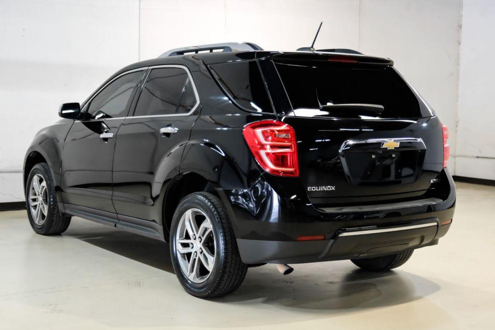 2017 Black Metallic /Jet Black Chevrolet Equinox Premier (2GNALDEK3H1) with an 2.4L 4-Cylinder SIDI DOHC VVT engine, Automatic transmission, located at 15300 Midway Rd., Addison, TX, 75001, (972) 702-0011, 32.958321, -96.838074 - Photo#10