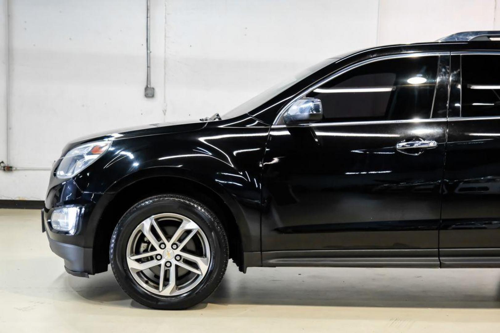 2017 Black Metallic /Jet Black Chevrolet Equinox Premier (2GNALDEK3H1) with an 2.4L 4-Cylinder SIDI DOHC VVT engine, Automatic transmission, located at 15300 Midway Rd., Addison, TX, 75001, (972) 702-0011, 32.958321, -96.838074 - Photo#12