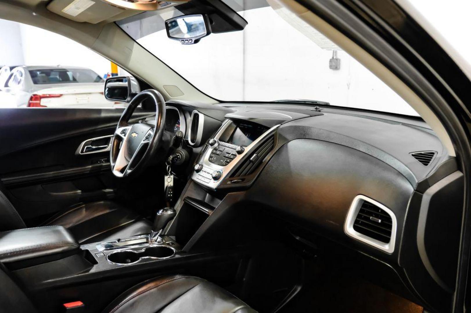 2017 Black Metallic /Jet Black Chevrolet Equinox Premier (2GNALDEK3H1) with an 2.4L 4-Cylinder SIDI DOHC VVT engine, Automatic transmission, located at 15300 Midway Rd., Addison, TX, 75001, (972) 702-0011, 32.958321, -96.838074 - Photo#14