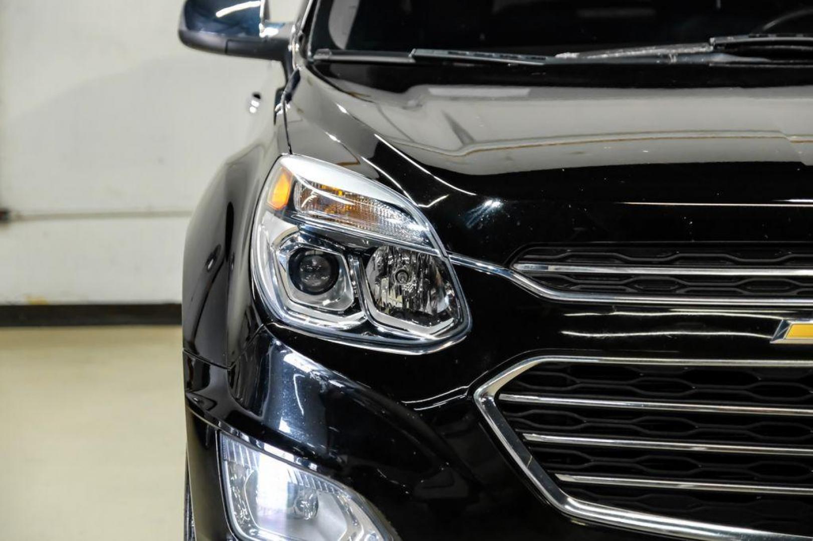 2017 Black Metallic /Jet Black Chevrolet Equinox Premier (2GNALDEK3H1) with an 2.4L 4-Cylinder SIDI DOHC VVT engine, Automatic transmission, located at 15300 Midway Rd., Addison, TX, 75001, (972) 702-0011, 32.958321, -96.838074 - Photo#42