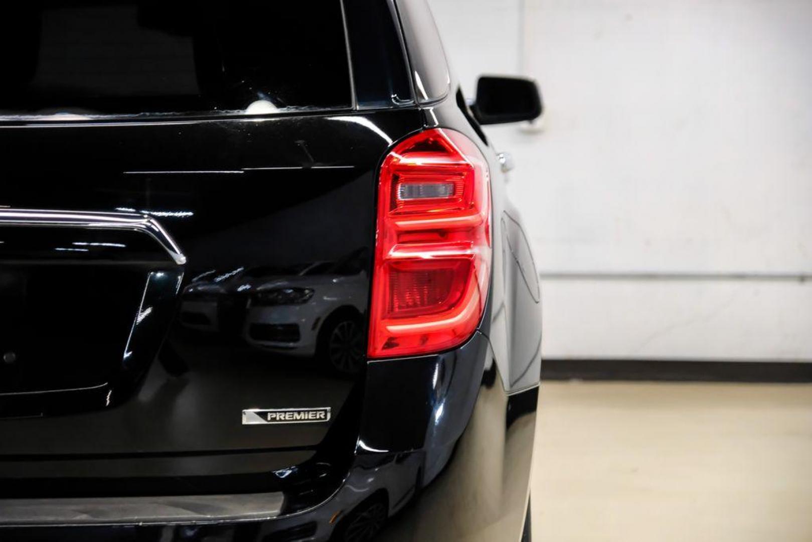 2017 Black Metallic /Jet Black Chevrolet Equinox Premier (2GNALDEK3H1) with an 2.4L 4-Cylinder SIDI DOHC VVT engine, Automatic transmission, located at 15300 Midway Rd., Addison, TX, 75001, (972) 702-0011, 32.958321, -96.838074 - Photo#43