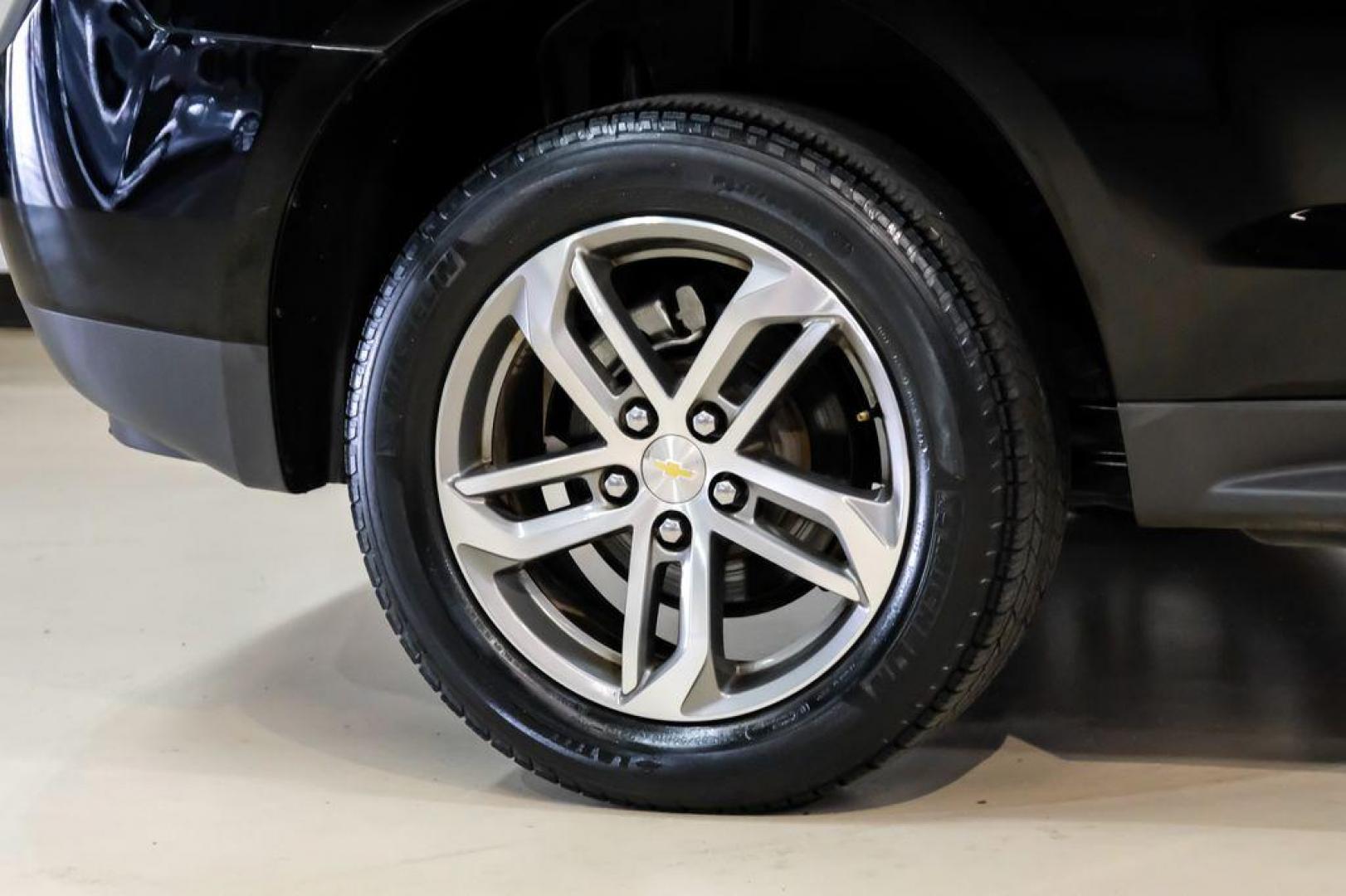 2017 Black Metallic /Jet Black Chevrolet Equinox Premier (2GNALDEK3H1) with an 2.4L 4-Cylinder SIDI DOHC VVT engine, Automatic transmission, located at 15300 Midway Rd., Addison, TX, 75001, (972) 702-0011, 32.958321, -96.838074 - Photo#49