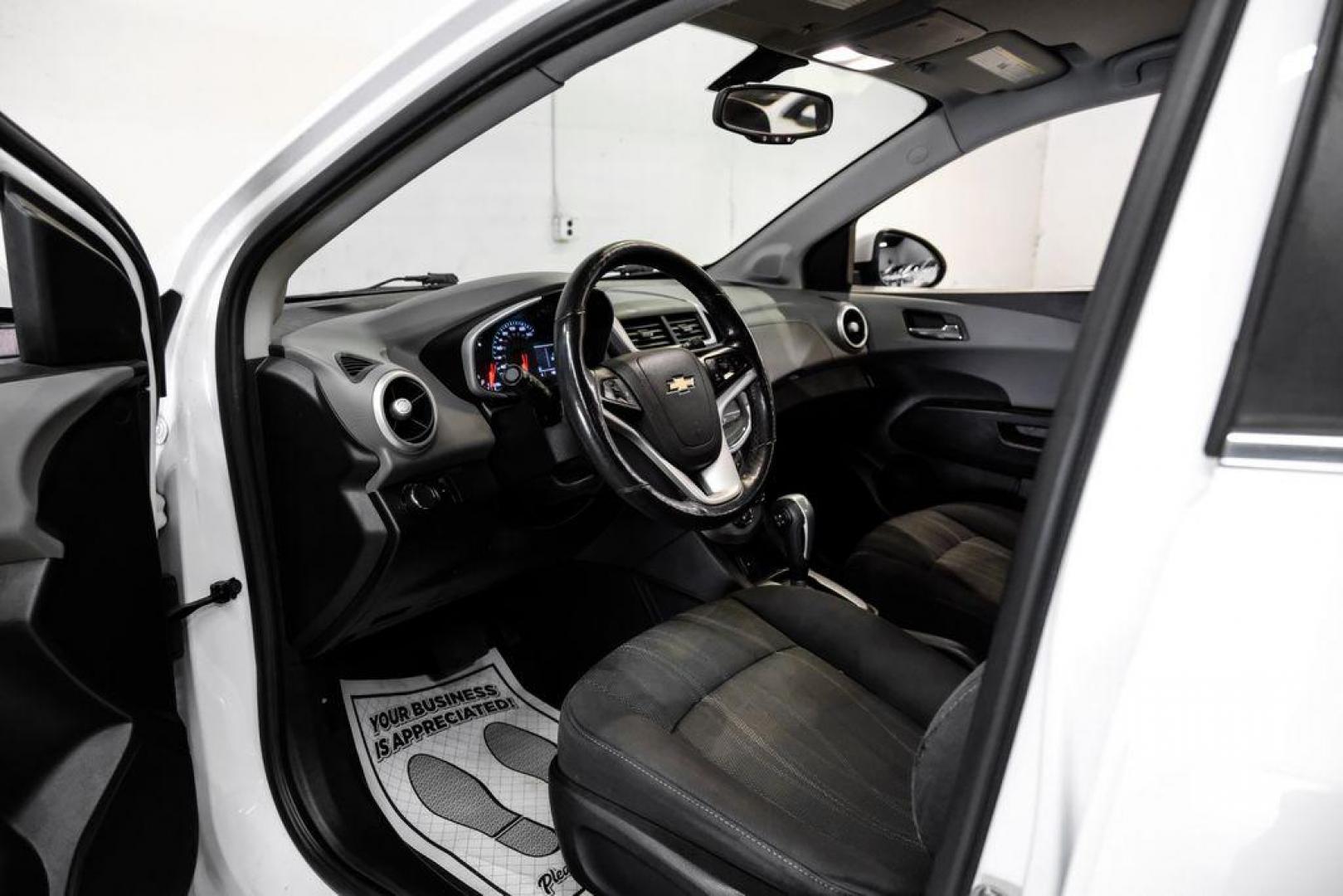 2019 Summit White /Jet Black/Dark Titanium Chevrolet Sonic LT (1G1JD5SB7K4) with an I4 engine, Automatic transmission, located at 15300 Midway Rd., Addison, TX, 75001, (972) 702-0011, 32.958321, -96.838074 - Photo#2