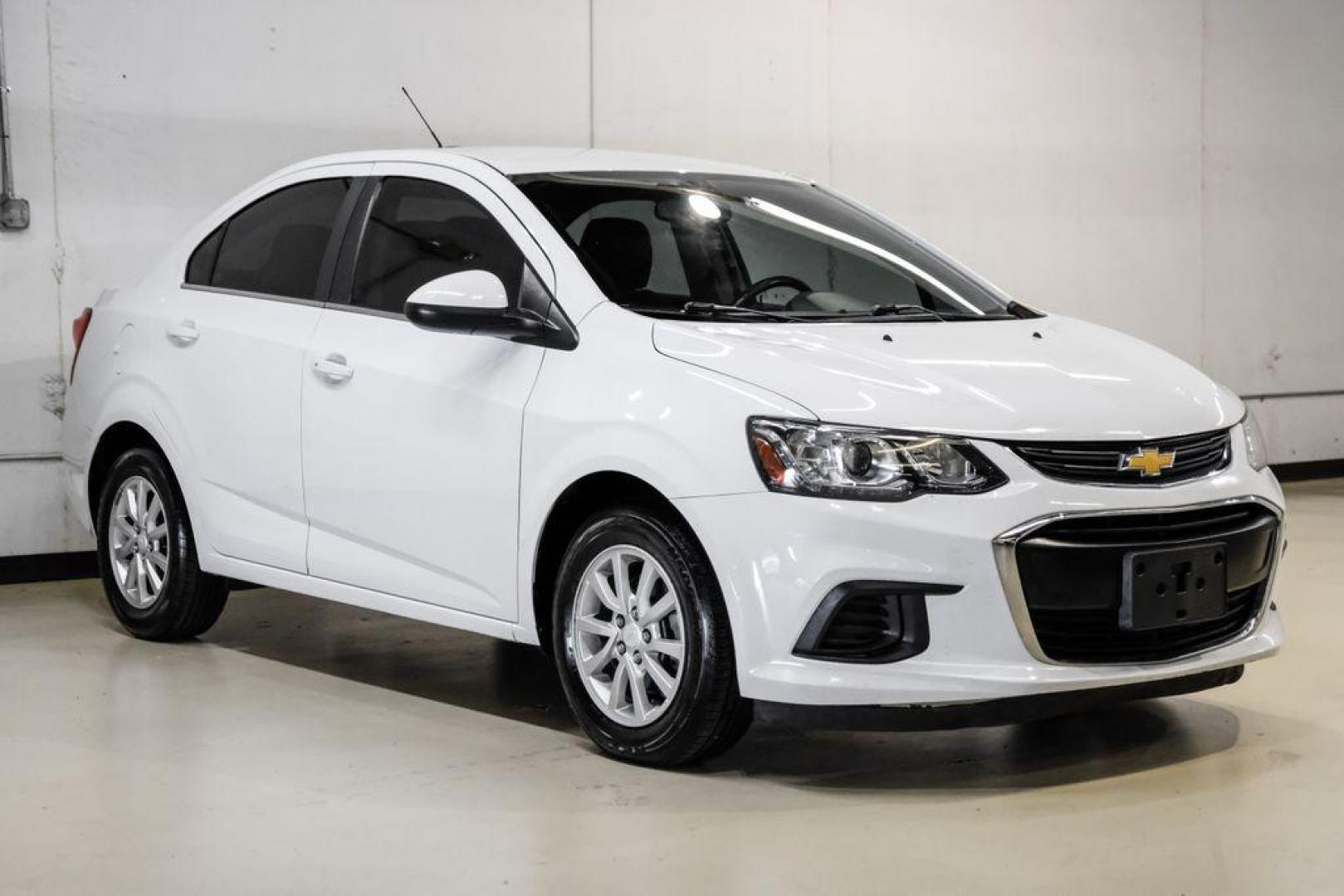 2019 Summit White /Jet Black/Dark Titanium Chevrolet Sonic LT (1G1JD5SB7K4) with an I4 engine, Automatic transmission, located at 15300 Midway Rd., Addison, TX, 75001, (972) 702-0011, 32.958321, -96.838074 - Photo#5