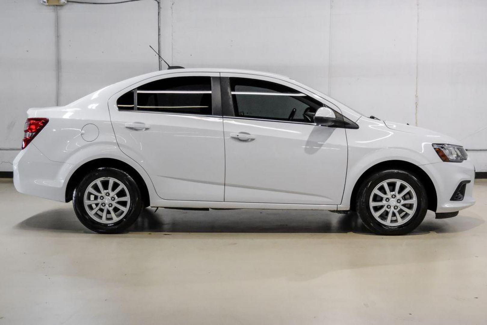 2019 Summit White /Jet Black/Dark Titanium Chevrolet Sonic LT (1G1JD5SB7K4) with an I4 engine, Automatic transmission, located at 15300 Midway Rd., Addison, TX, 75001, (972) 702-0011, 32.958321, -96.838074 - Photo#6