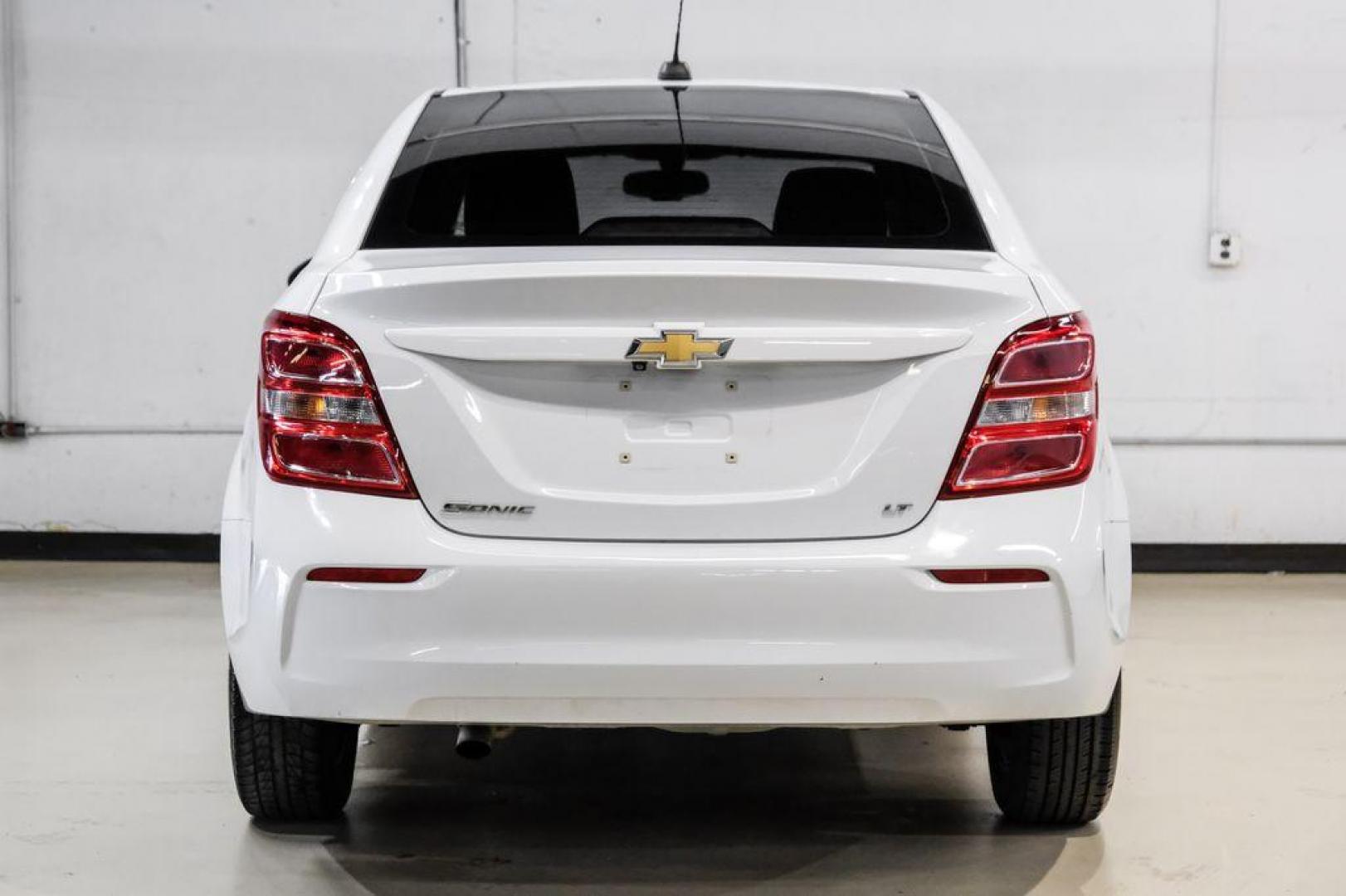 2019 Summit White /Jet Black/Dark Titanium Chevrolet Sonic LT (1G1JD5SB7K4) with an I4 engine, Automatic transmission, located at 15300 Midway Rd., Addison, TX, 75001, (972) 702-0011, 32.958321, -96.838074 - Photo#8