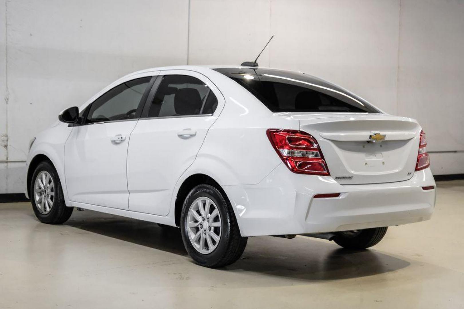 2019 Summit White /Jet Black/Dark Titanium Chevrolet Sonic LT (1G1JD5SB7K4) with an I4 engine, Automatic transmission, located at 15300 Midway Rd., Addison, TX, 75001, (972) 702-0011, 32.958321, -96.838074 - Photo#9