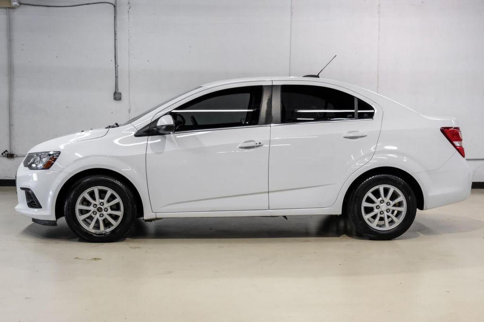 2019 Summit White /Jet Black/Dark Titanium Chevrolet Sonic LT (1G1JD5SB7K4) with an I4 engine, Automatic transmission, located at 15300 Midway Rd., Addison, TX, 75001, (972) 702-0011, 32.958321, -96.838074 - Photo#10