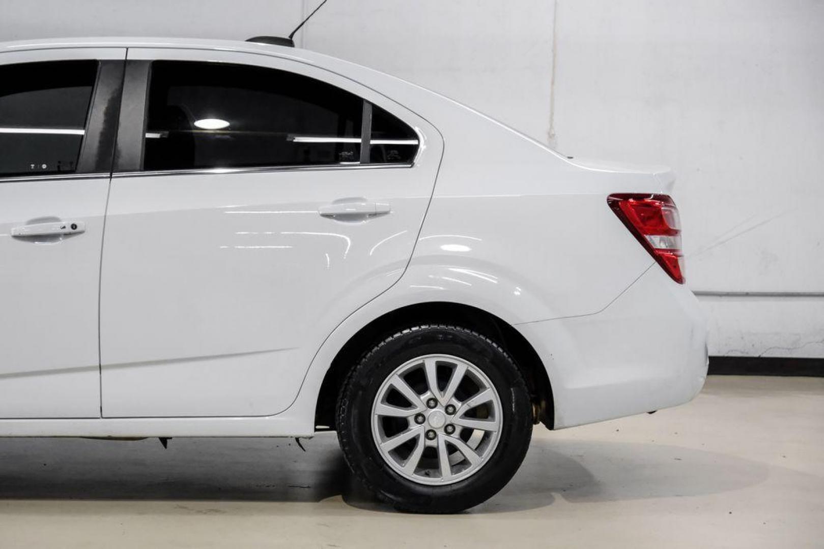 2019 Summit White /Jet Black/Dark Titanium Chevrolet Sonic LT (1G1JD5SB7K4) with an I4 engine, Automatic transmission, located at 15300 Midway Rd., Addison, TX, 75001, (972) 702-0011, 32.958321, -96.838074 - Photo#12