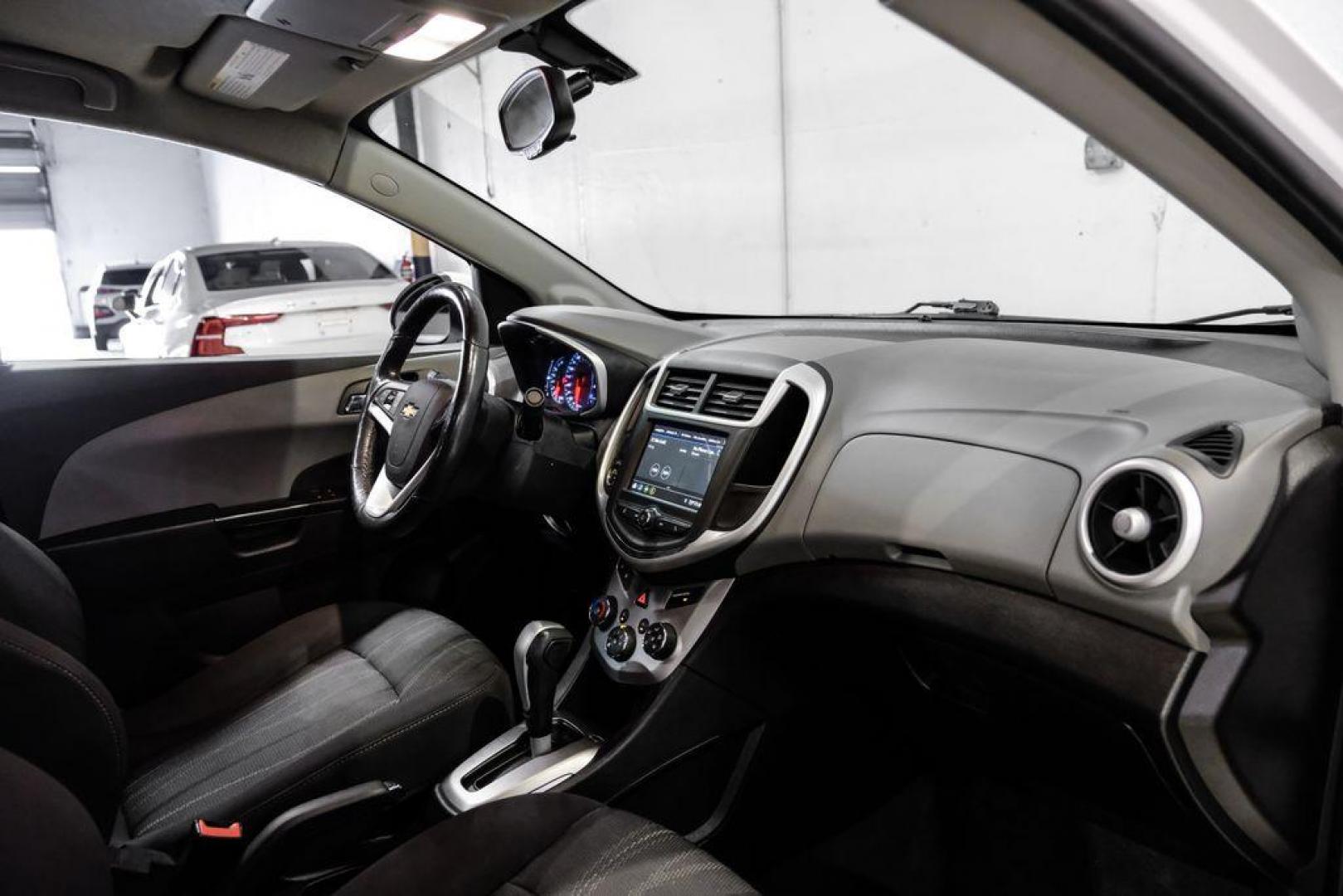 2019 Summit White /Jet Black/Dark Titanium Chevrolet Sonic LT (1G1JD5SB7K4) with an I4 engine, Automatic transmission, located at 15300 Midway Rd., Addison, TX, 75001, (972) 702-0011, 32.958321, -96.838074 - Photo#13